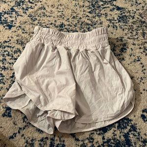 White Lululemon size 2 track that shorts